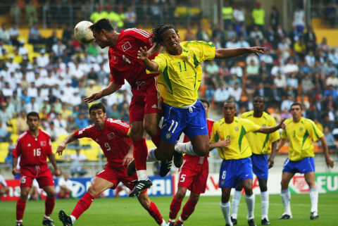 Fatih Akyel of Turkey and Ronaldinho of Brazil