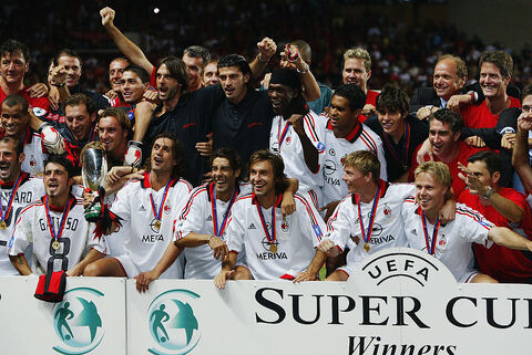 AC Milan players celebrate victory